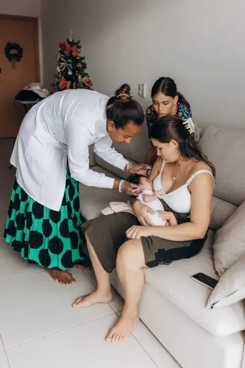 a new mother during a breast feeding consultation - thanks Johnathon for catching the typo